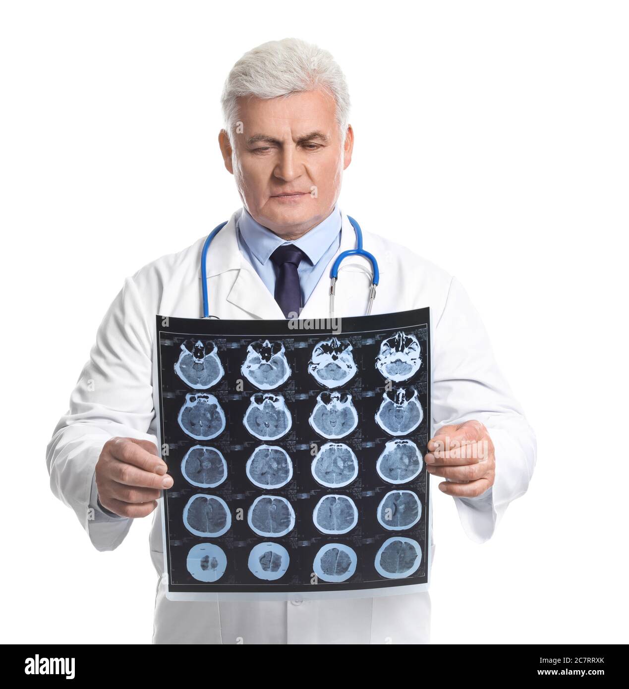 Senior neurologist with MRI scan of human head on white background Stock Photo