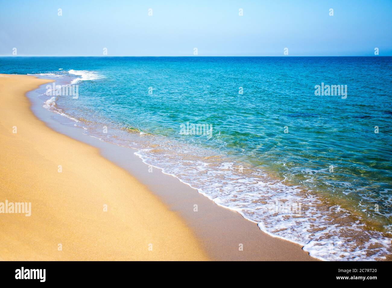 summer beach background with sand, sea and clear sky Stock Photo - Alamy