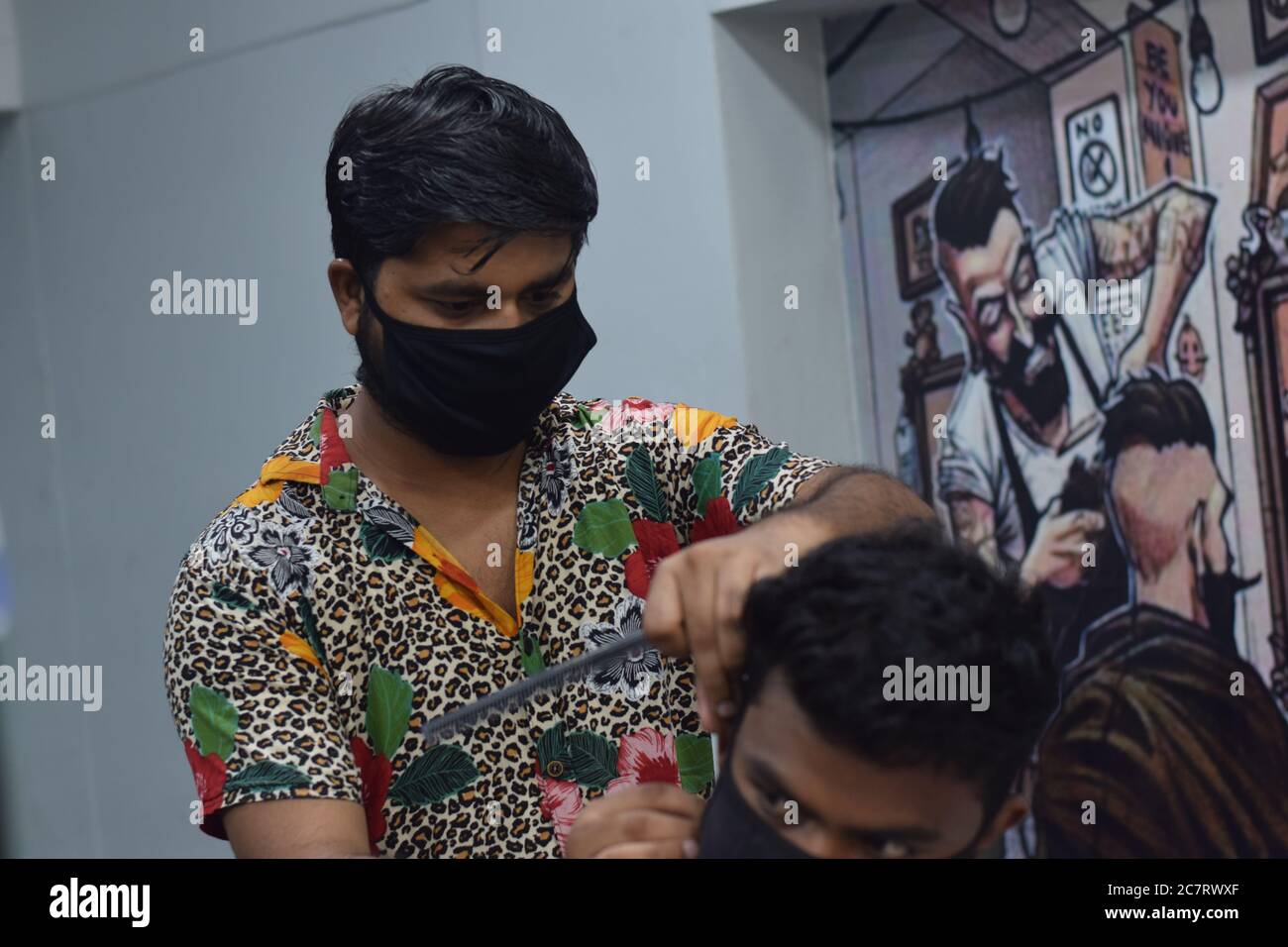 Hyderabad, Telangana, India. june292020 A hairdresser, wearing a
