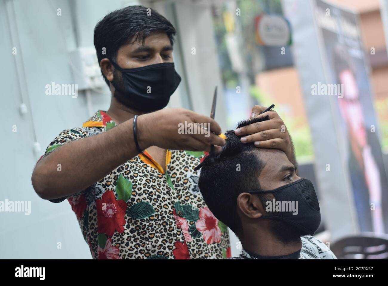 Hyderabad, Telangana, India. june292020 A hairdresser, wearing a