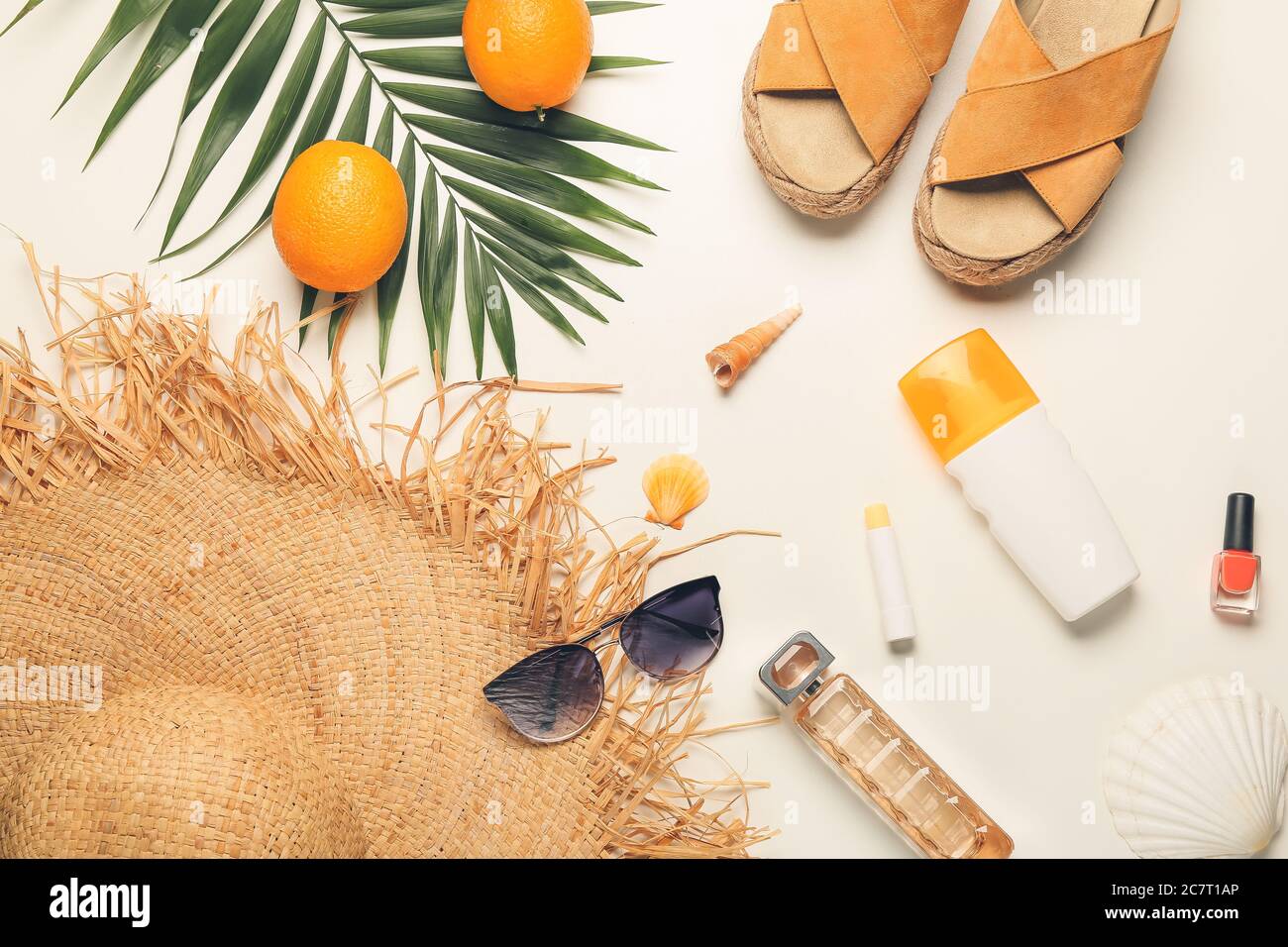 Summer composition with beach accessories on white background Stock Photo