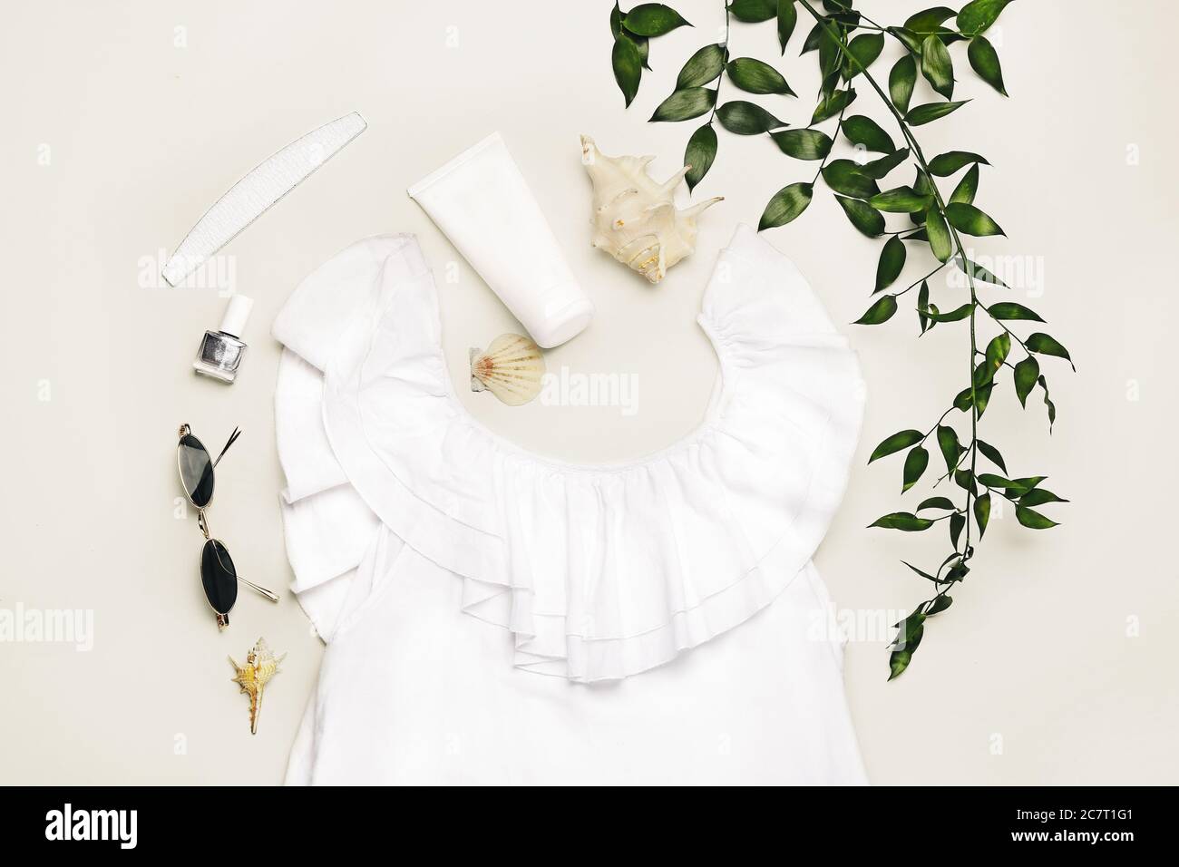Summer composition with female clothes on white background Stock Photo