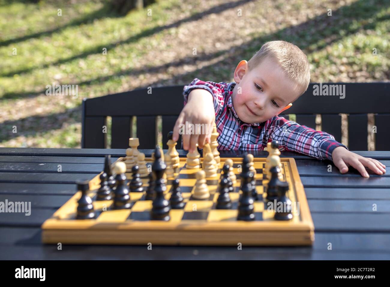 Clever Concentrated and Thinking Child while Playing Chess. Thinking Child.  Chess, Success and Winning Stock Image - Image of decisions, chess:  175817817