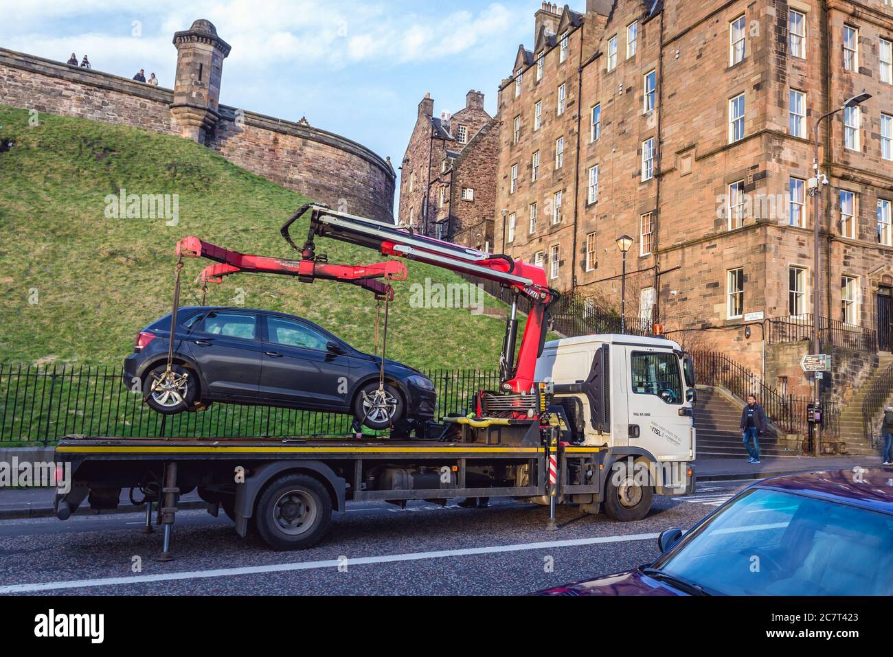 Tow truck lifted illegaly parked car on Johnston Terrace street in