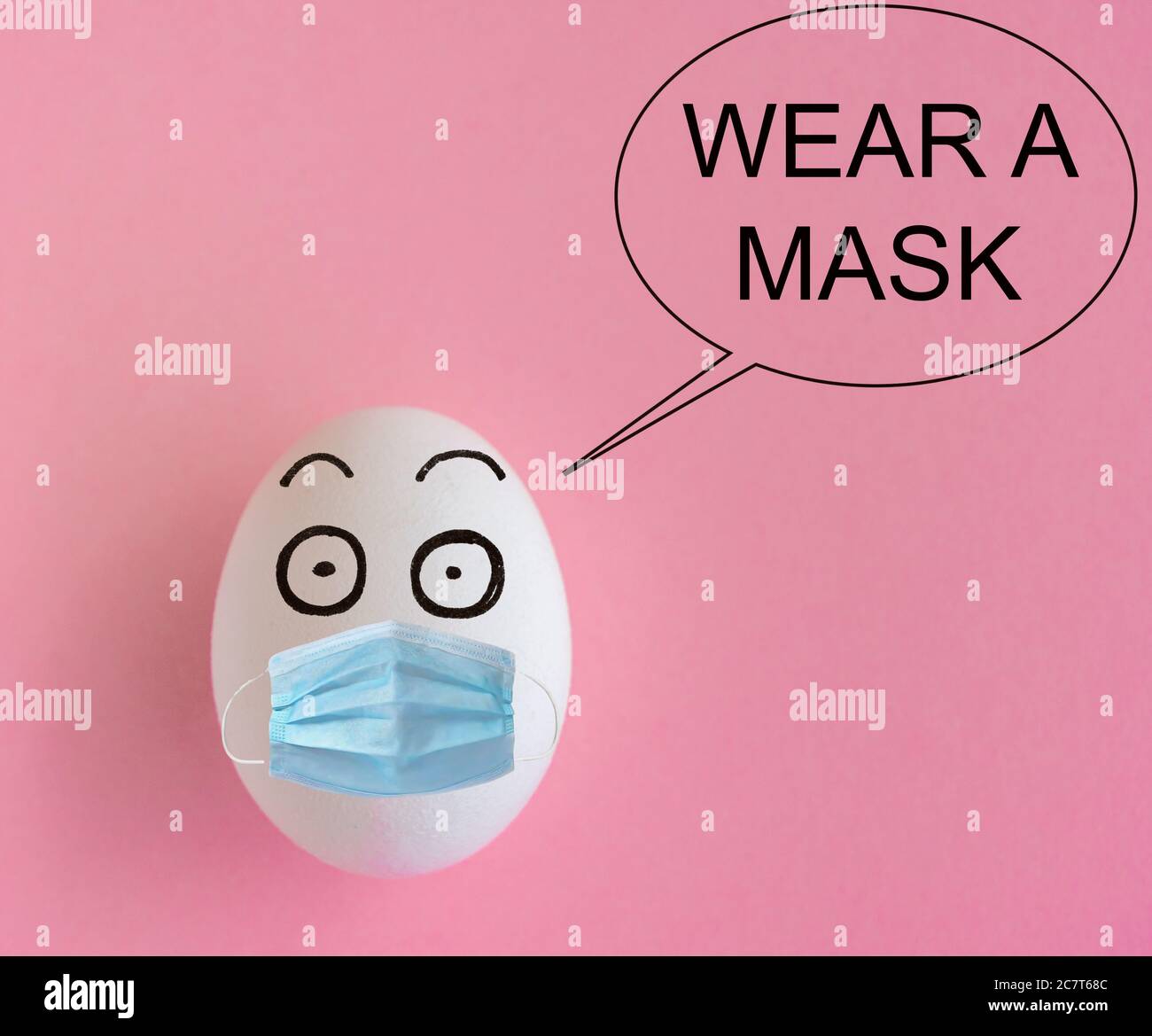 Faces on the eggs, coronavirus outbreak prevention concept, wear a mask Stock Photo