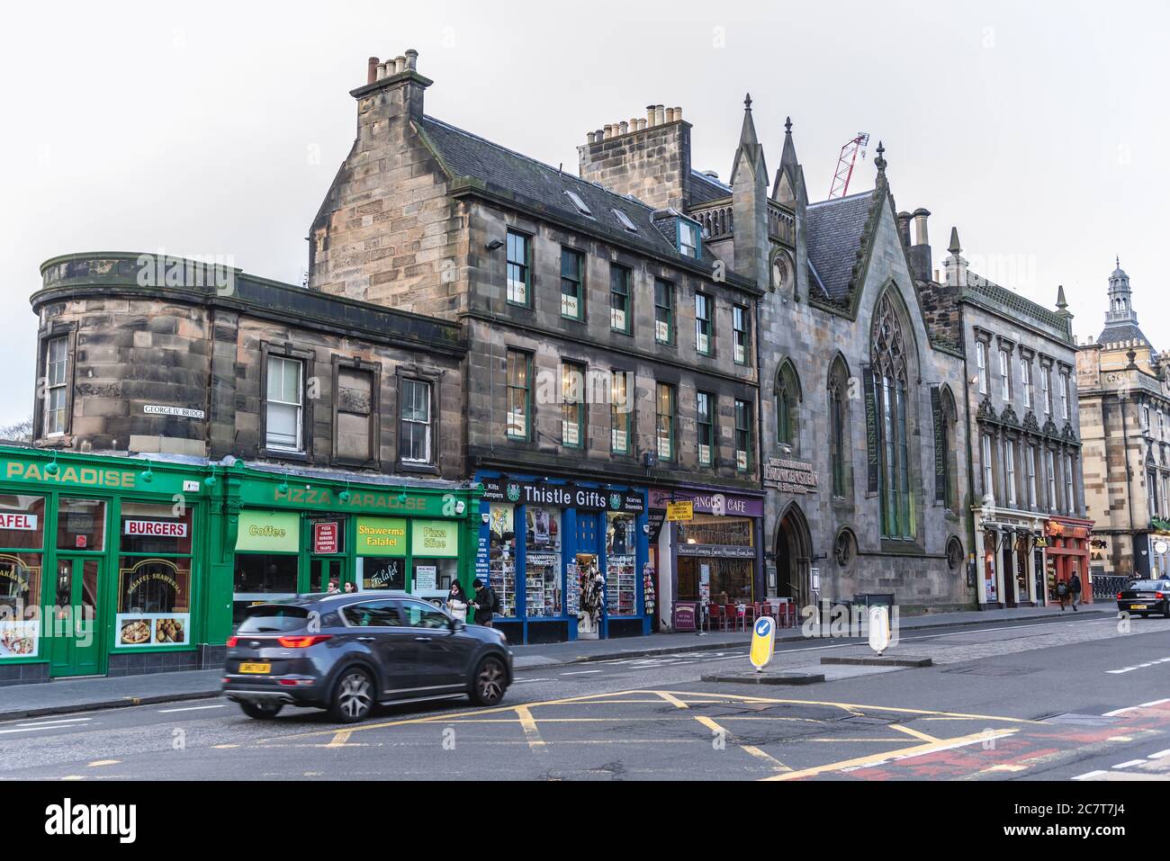 Pizza Paradise and Thistle Gifts shop on George IV Bridge street in Edinburgh, the capital of Scotland, part of United Kingdom Stock Photo