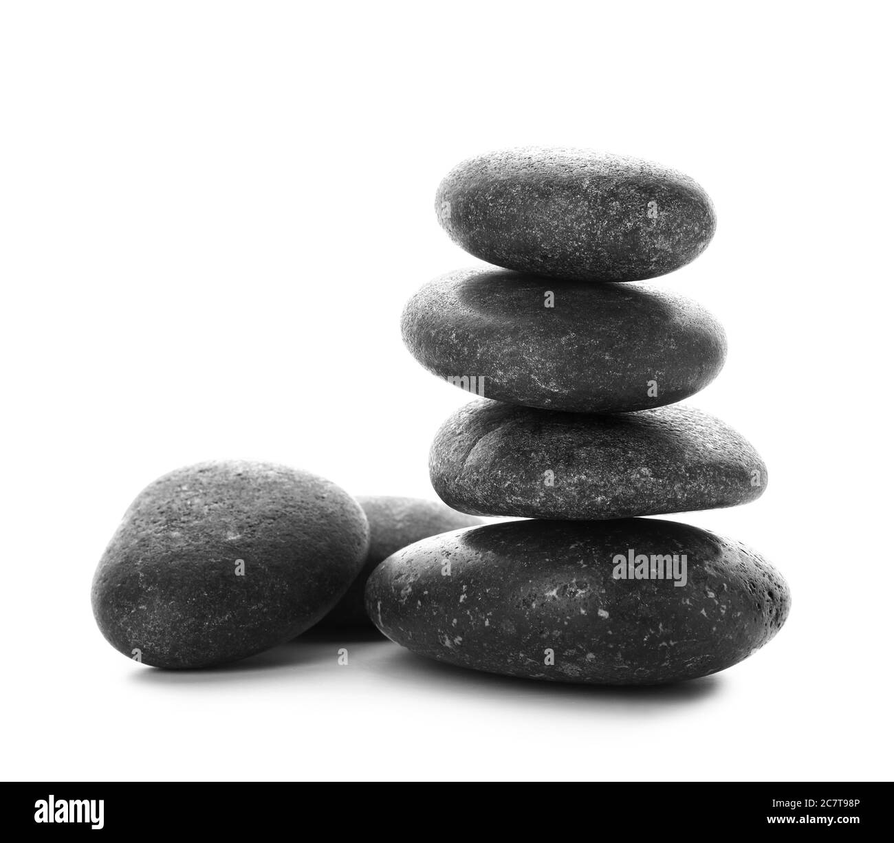 Spa stones on white background Stock Photo - Alamy