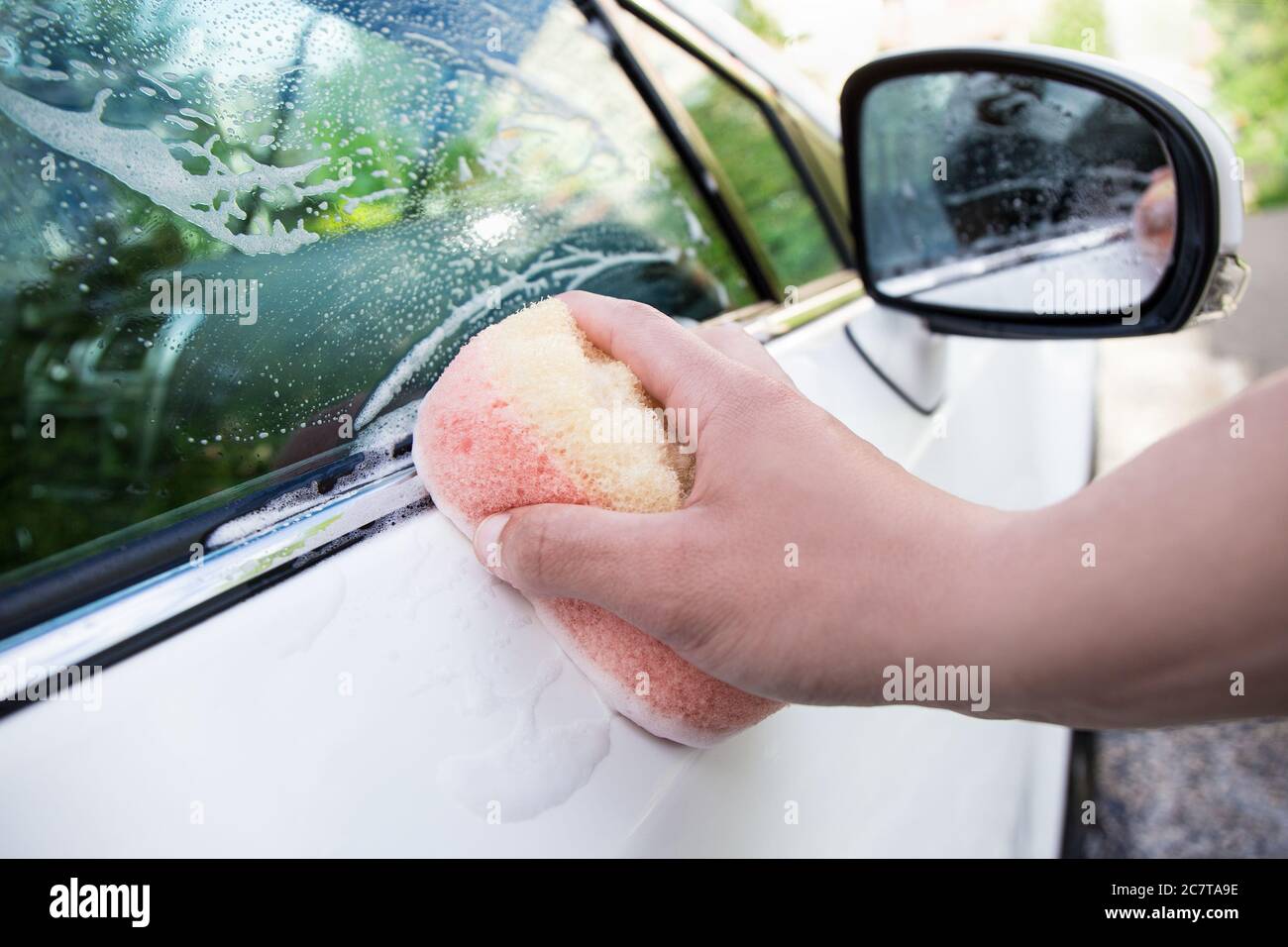 Hand in washing up with soap suds hi-res stock photography and images ...
