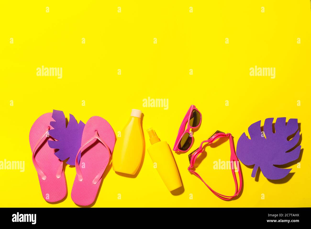 Composition with beach accessories on color background Stock Photo