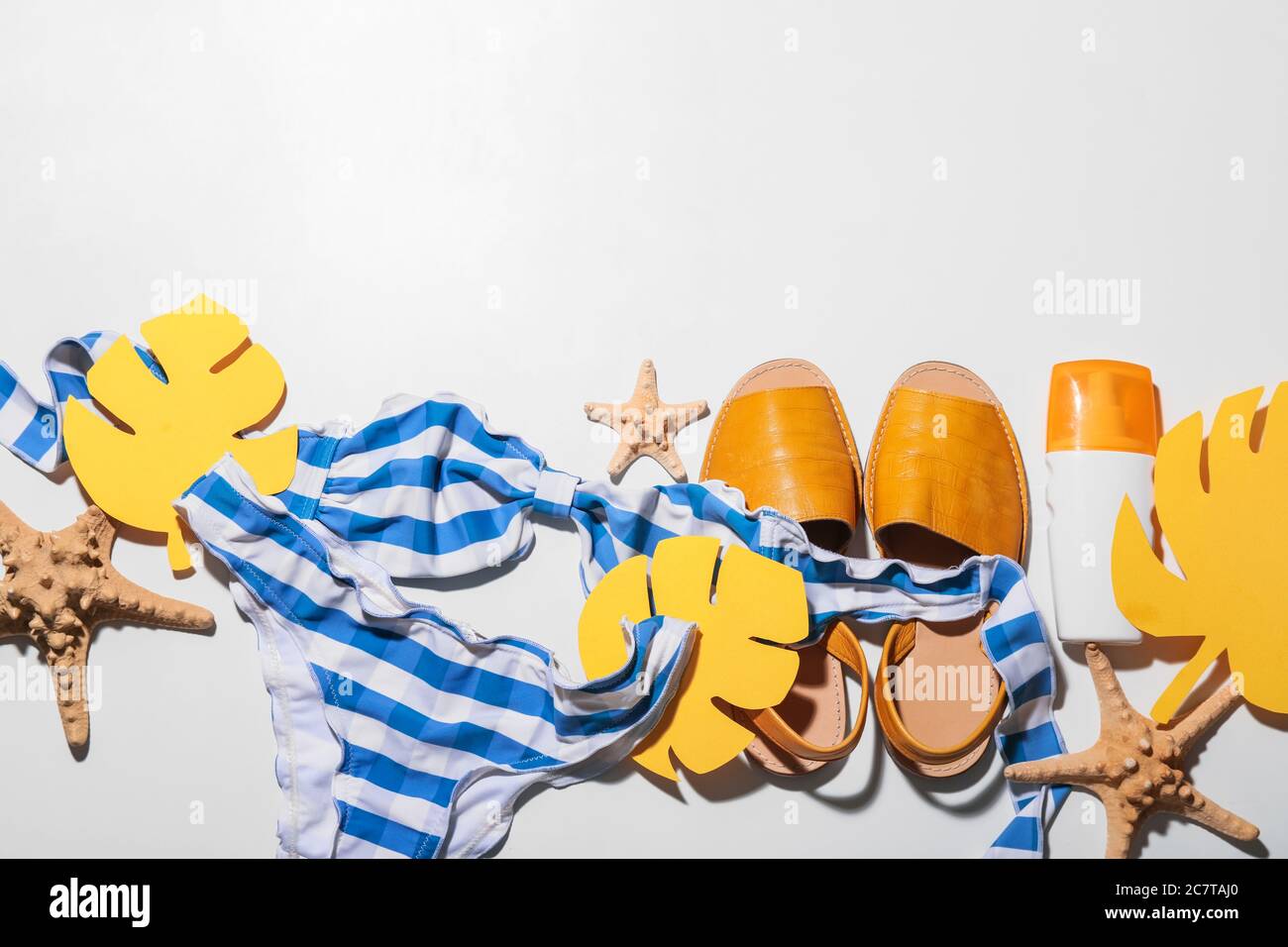 Composition with beach accessories on white background Stock Photo