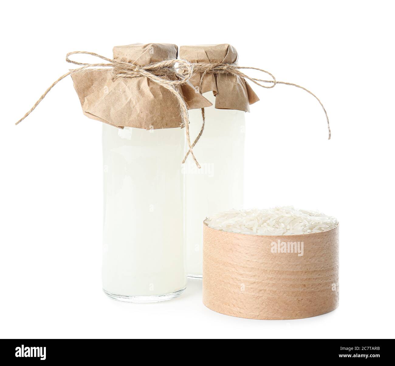 Bottles of rice water on white background Stock Photo Alamy