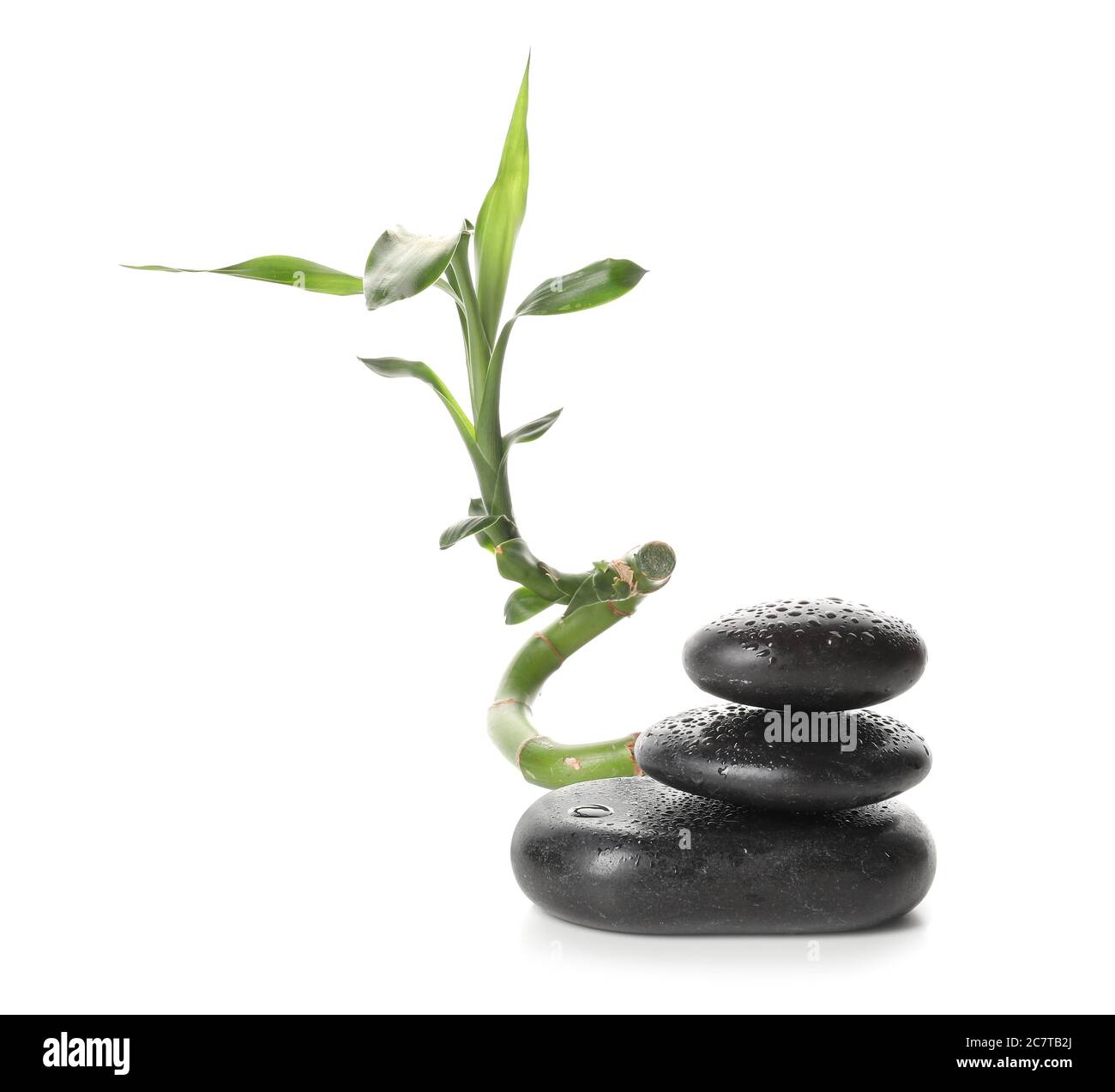 Spa stones and bamboo on white background Stock Photo - Alamy
