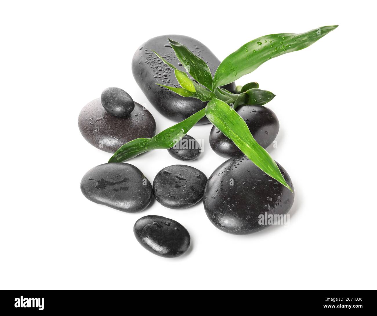 Spa stones and bamboo on white background Stock Photo - Alamy