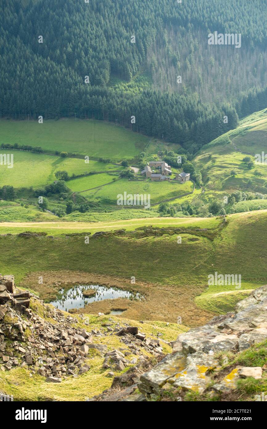 Alport Dale is a remove valley in the Peak District National Park with mant waterfalls and the famous Alport Castles, a major landslip Stock Photo