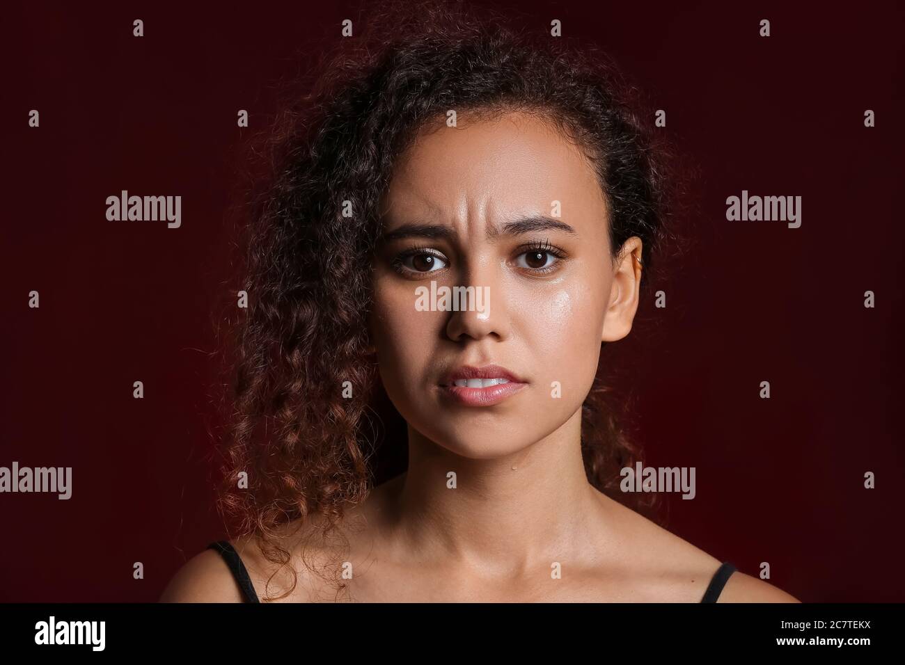 Sad African-American woman on dark background. Stop racism Stock Photo ...