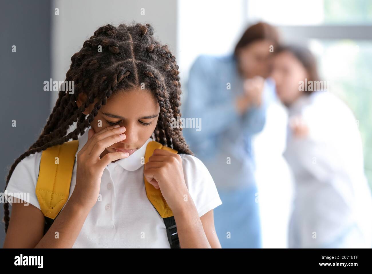 Pupils bullying African-American girl at school. Stop racism Stock ...