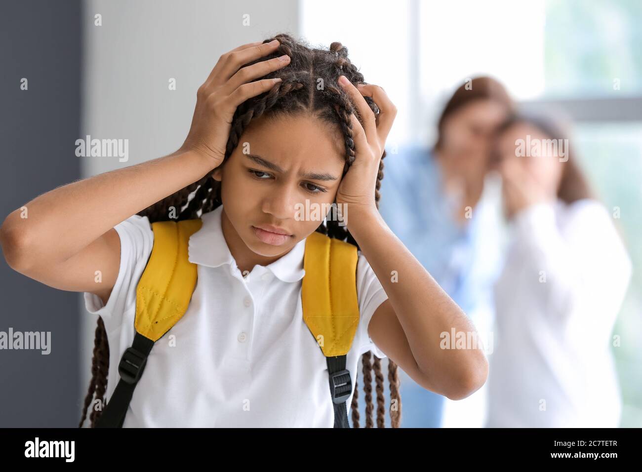 Pupils bullying African-American girl at school. Stop racism Stock ...