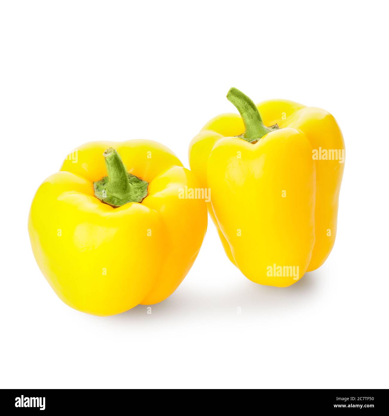 Yellow bell peppers on white background Stock Photo - Alamy