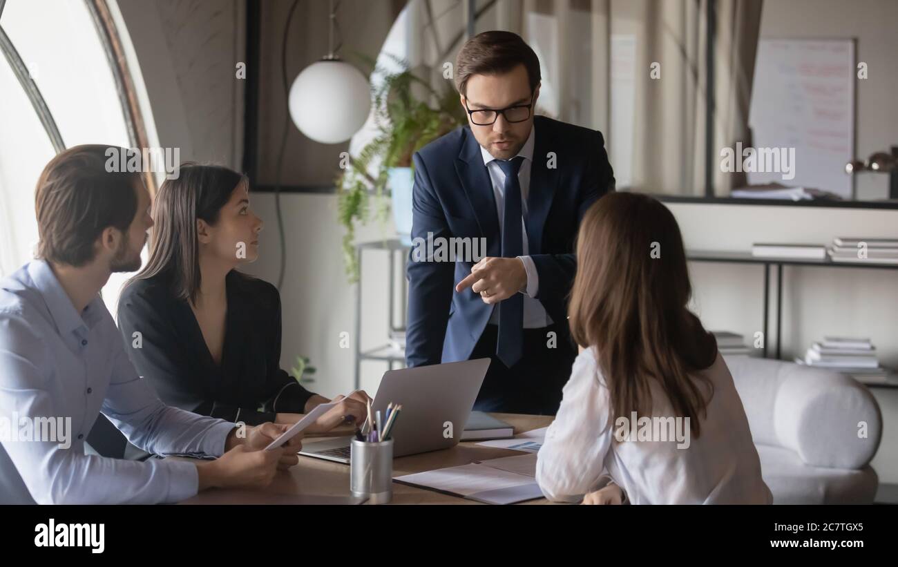 Multiracial businesspeople work together at office briefing Stock Photo