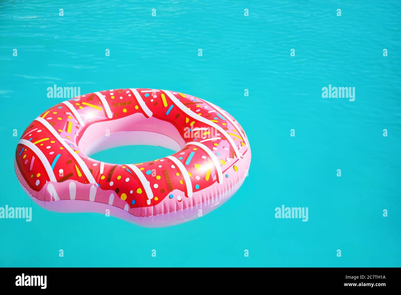 Inflatable ring in swimming pool Stock Photo - Alamy