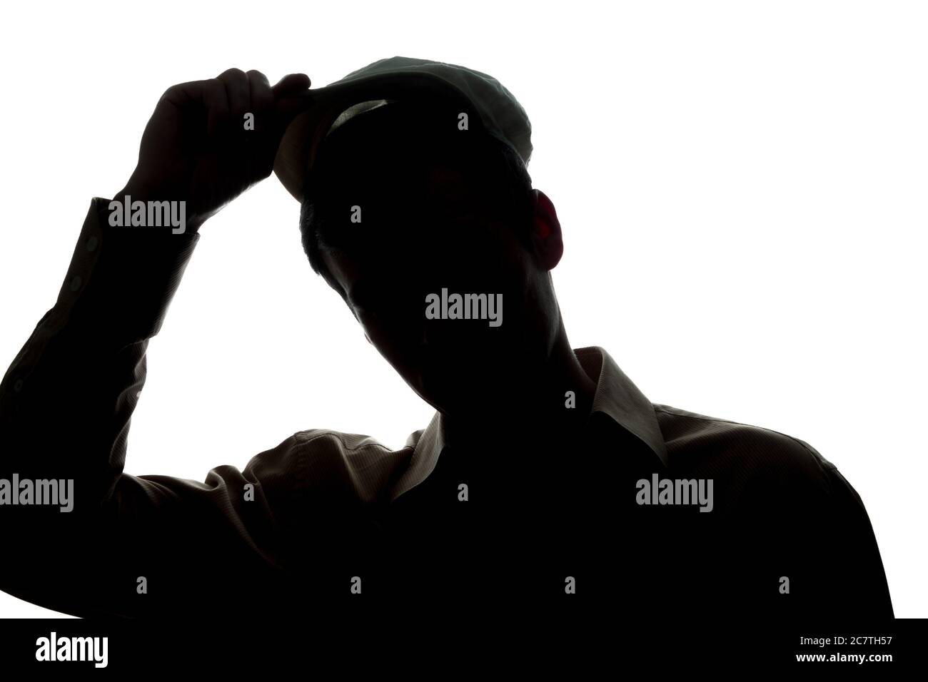 Portrait of a young man uncap, front view - silhouette Stock Photo