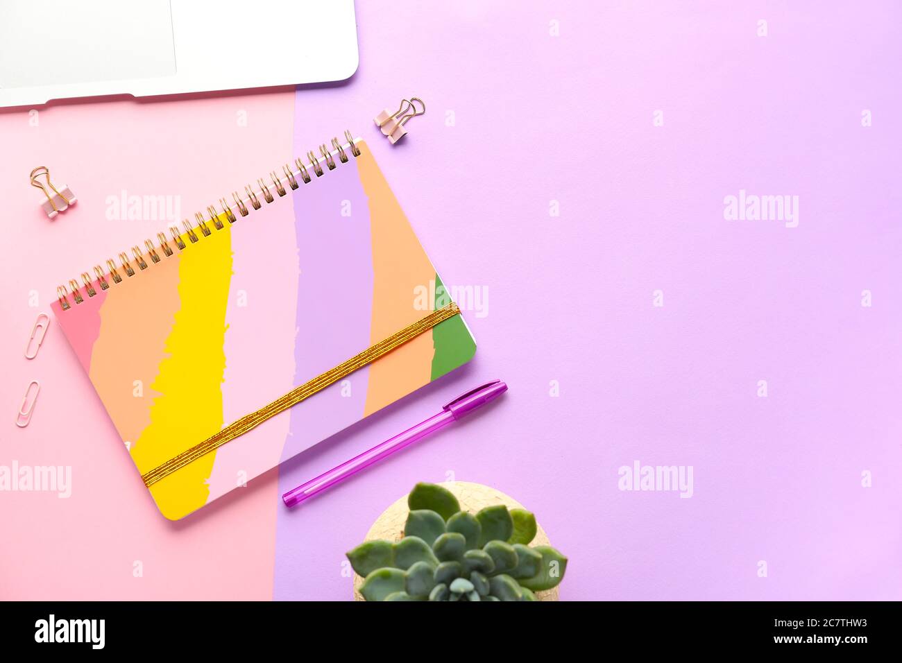 Composition with notebook on color background Stock Photo