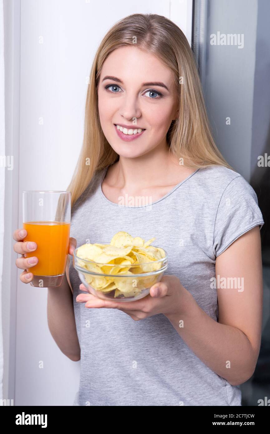 Female holding glass juice mouth hires stock photography and images