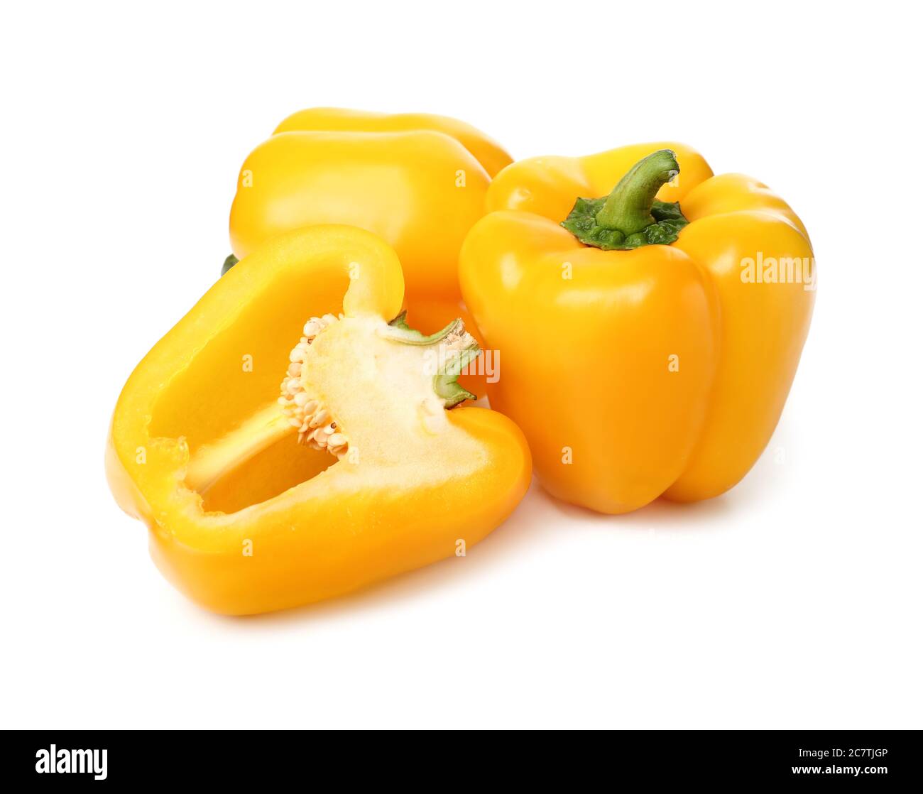 Yellow bell peppers on white background Stock Photo - Alamy