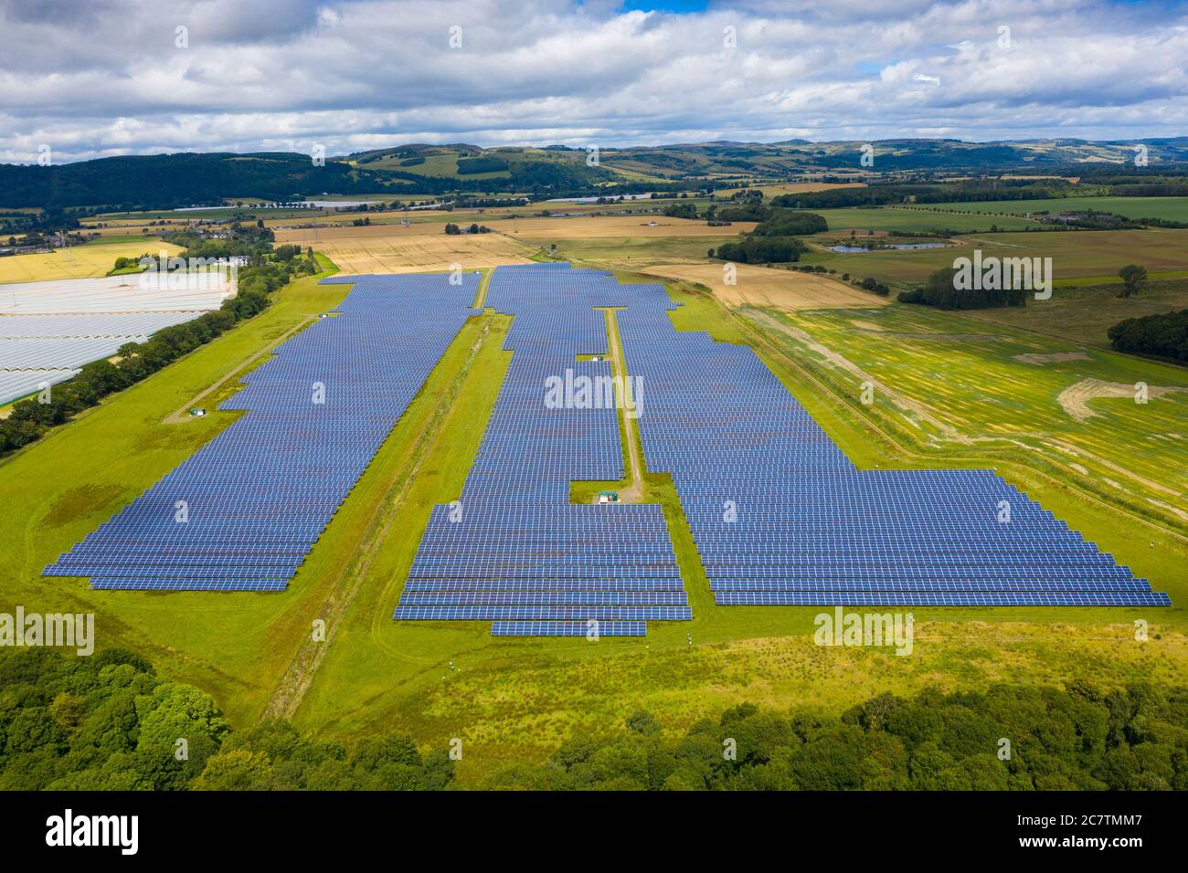 Aerial view of Errol solar farm near Perth in Scotland, UK. Operated by Elgin Energy it is largest solar farm in Scotland generating 13MW from 55,000 Stock Photo