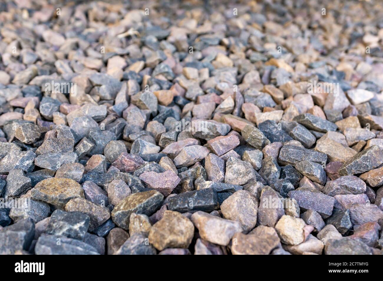 Little different shaped gray rocks in the beach Stock Photo - Alamy