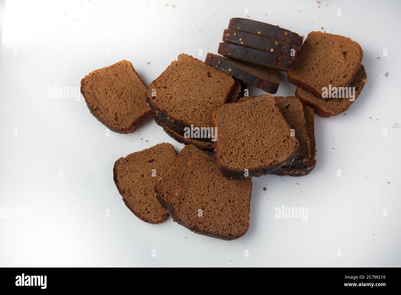 Fresh brown bread slice isolated on white background Stock Photo - Alamy