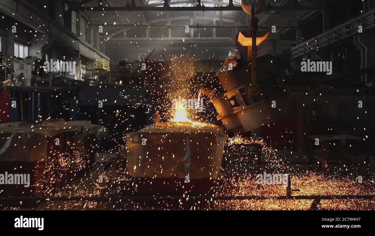 The molten metal is poured into the mold. Melting furnace for cast iron