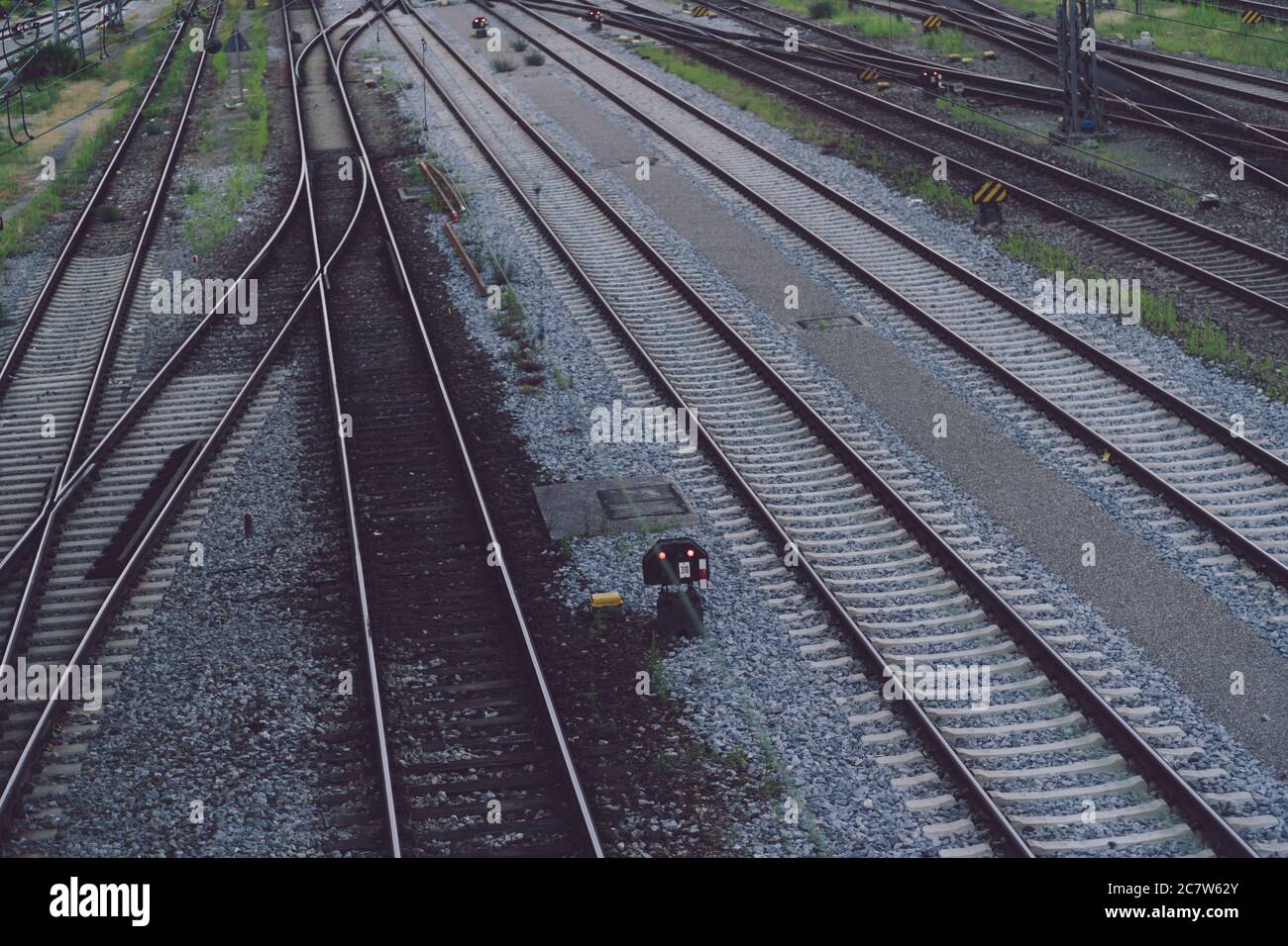 Branched train tracks near Munich central station. Stock Photo
