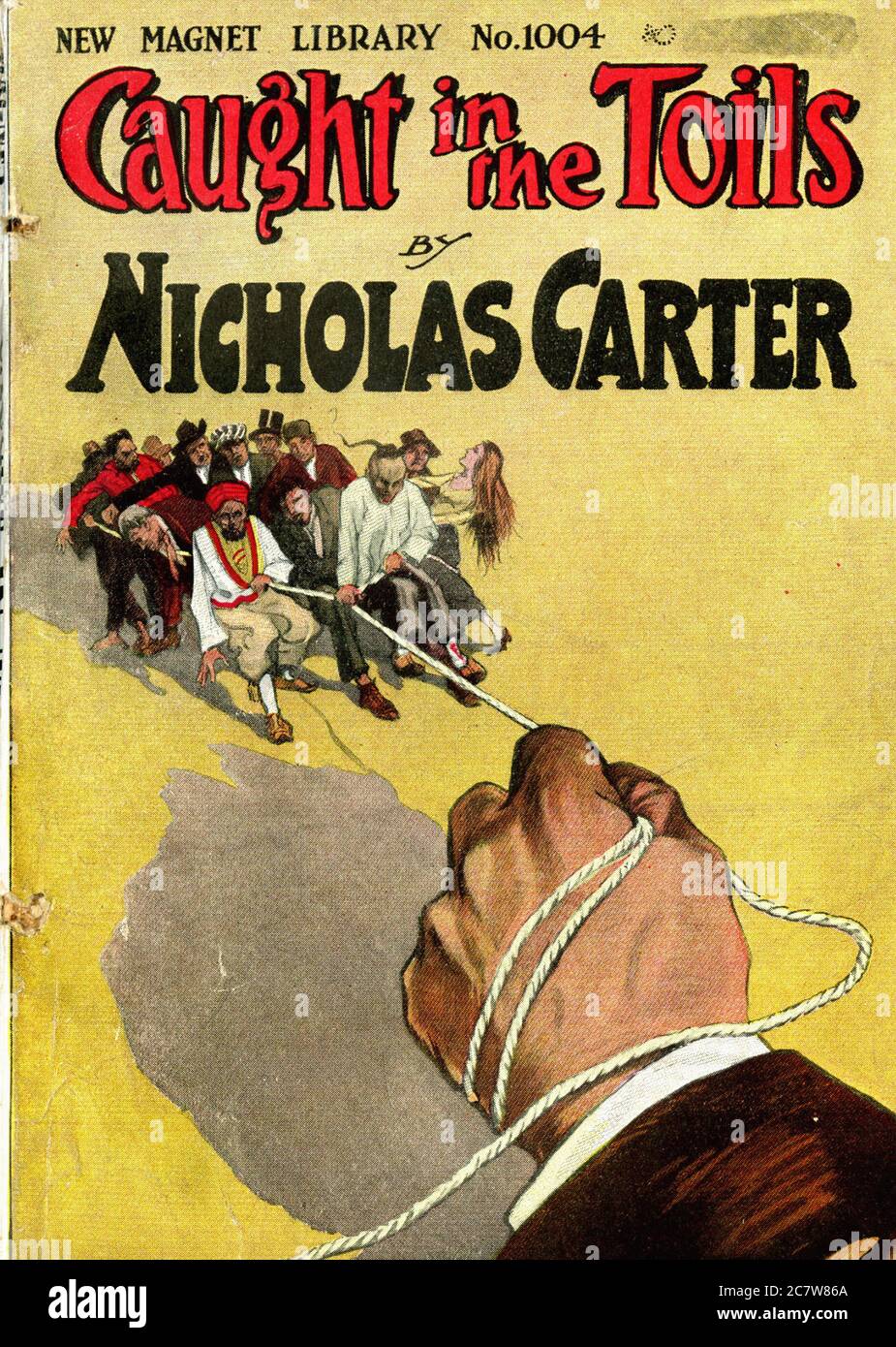 Nicholas Carter - Caught in the Toils  or, Nick Carter and the train robbers - New Magnet Library - Vintage Pulp Literary Stock Photo