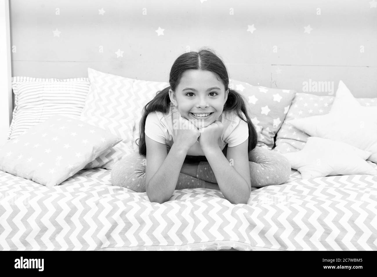 Little girl in pajamas get ready for bedtime. Relax and ease the ...