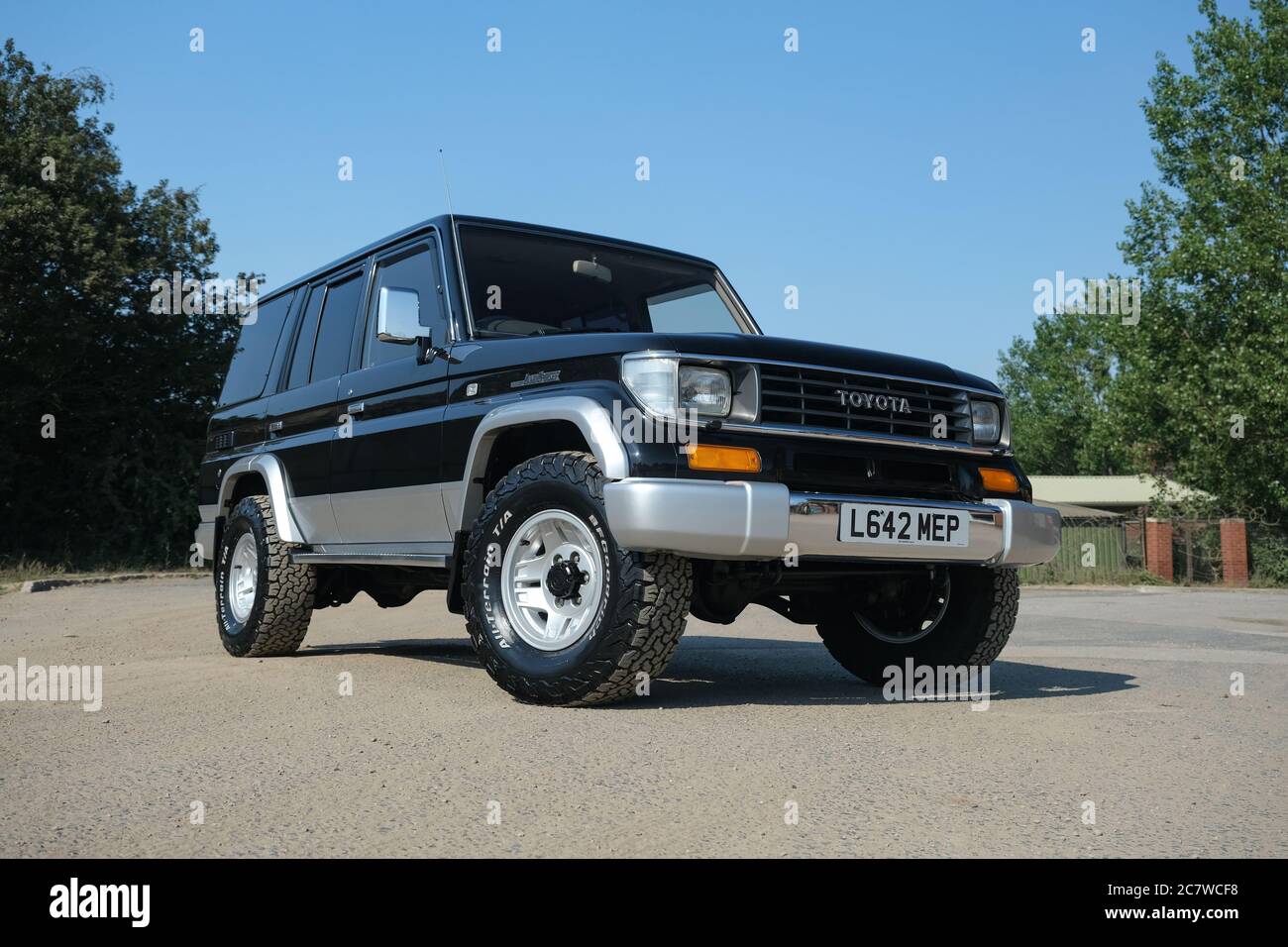 1993 Toyota Land Cruiser Prado parked on construction site Stock Photo