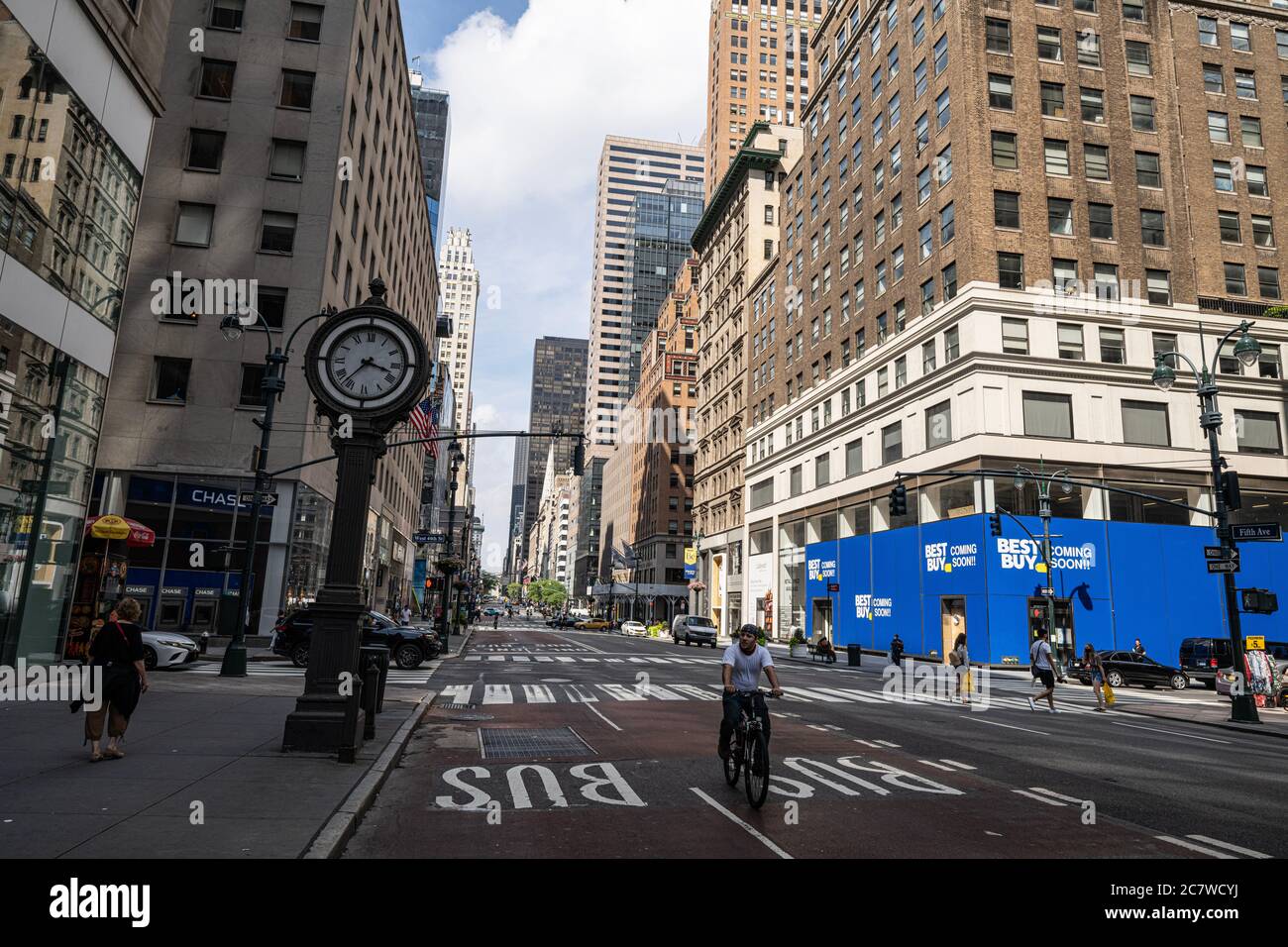 Empty streets in Manhattan during Phase 3 reopening after covid-19 pandemic crisis. Fifth AVE at 44th street Stock Photo