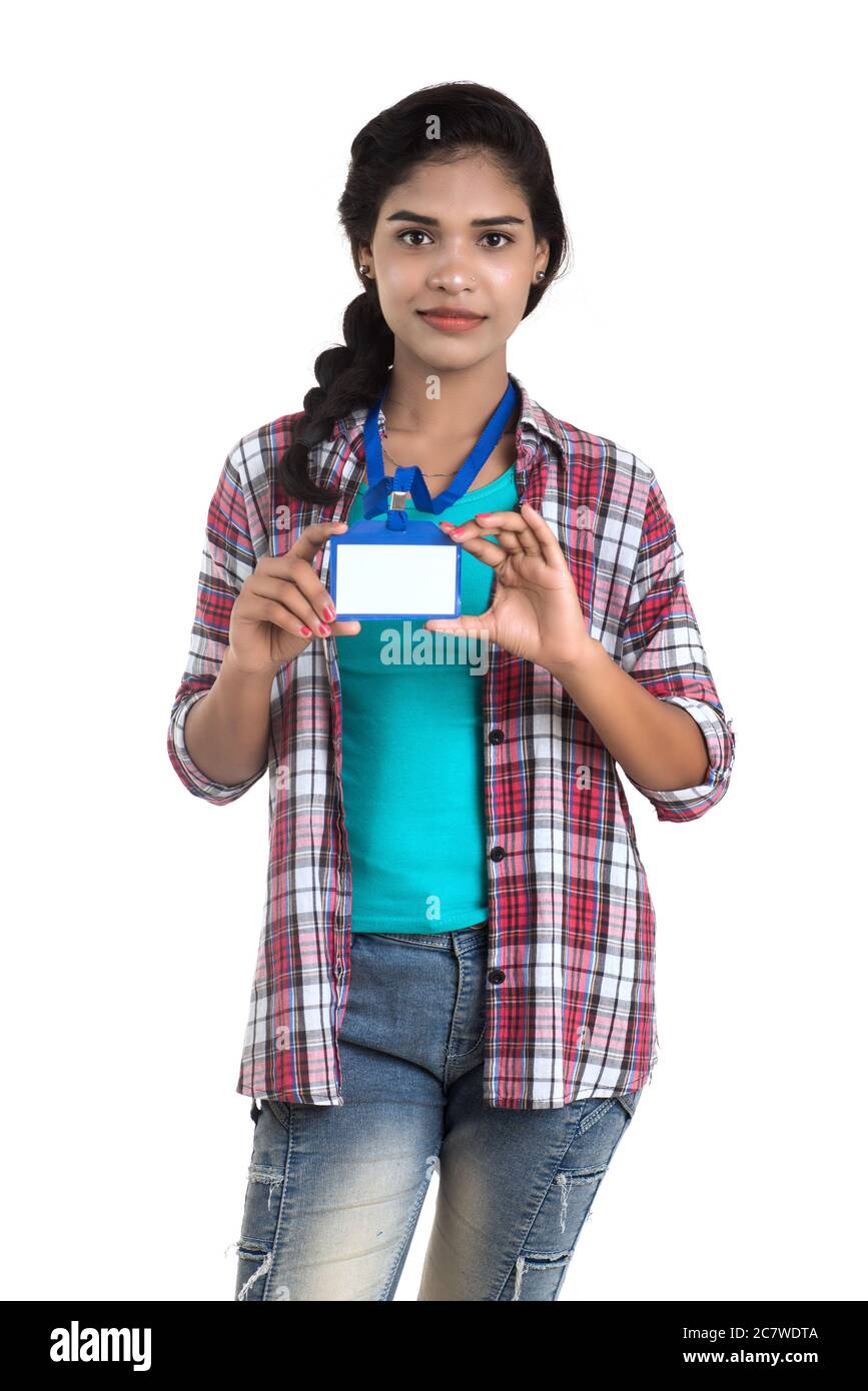 Young woman holding Identification white blank plastic id card Stock
