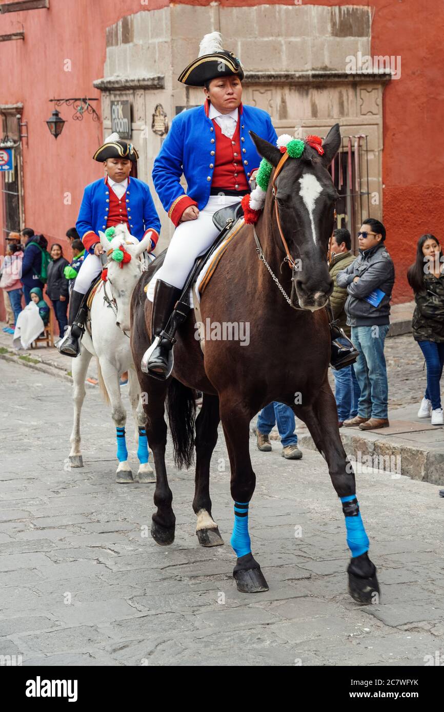 A historic actor rides a horse dressed in Spanish colonial uniform during a parade celebrating the 251st birthday of Mexican Independence hero Ignacio Allende January 21, 2020 in San Miguel de Allende, Guanajuato, Mexico. Allende, from a wealthy family in San Miguel played a major role in the independency war against Spain in 1810 and later honored by his home city by adding his name. Stock Photo