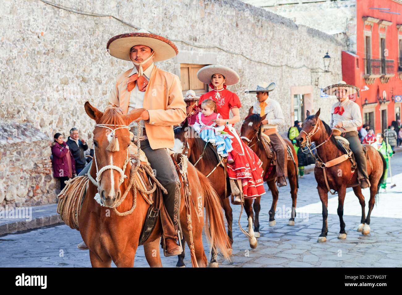 Mexican Cowboys ride their horses in a parade to celebrate the 251st birthday of the Mexican Independence hero Ignacio Allende January 21, 2020 in San Miguel de Allende, Guanajuato, Mexico. Allende, from a wealthy family in San Miguel played a major role in the independency war against Spain in 1810 and later honored by his home city by adding his name. Stock Photo