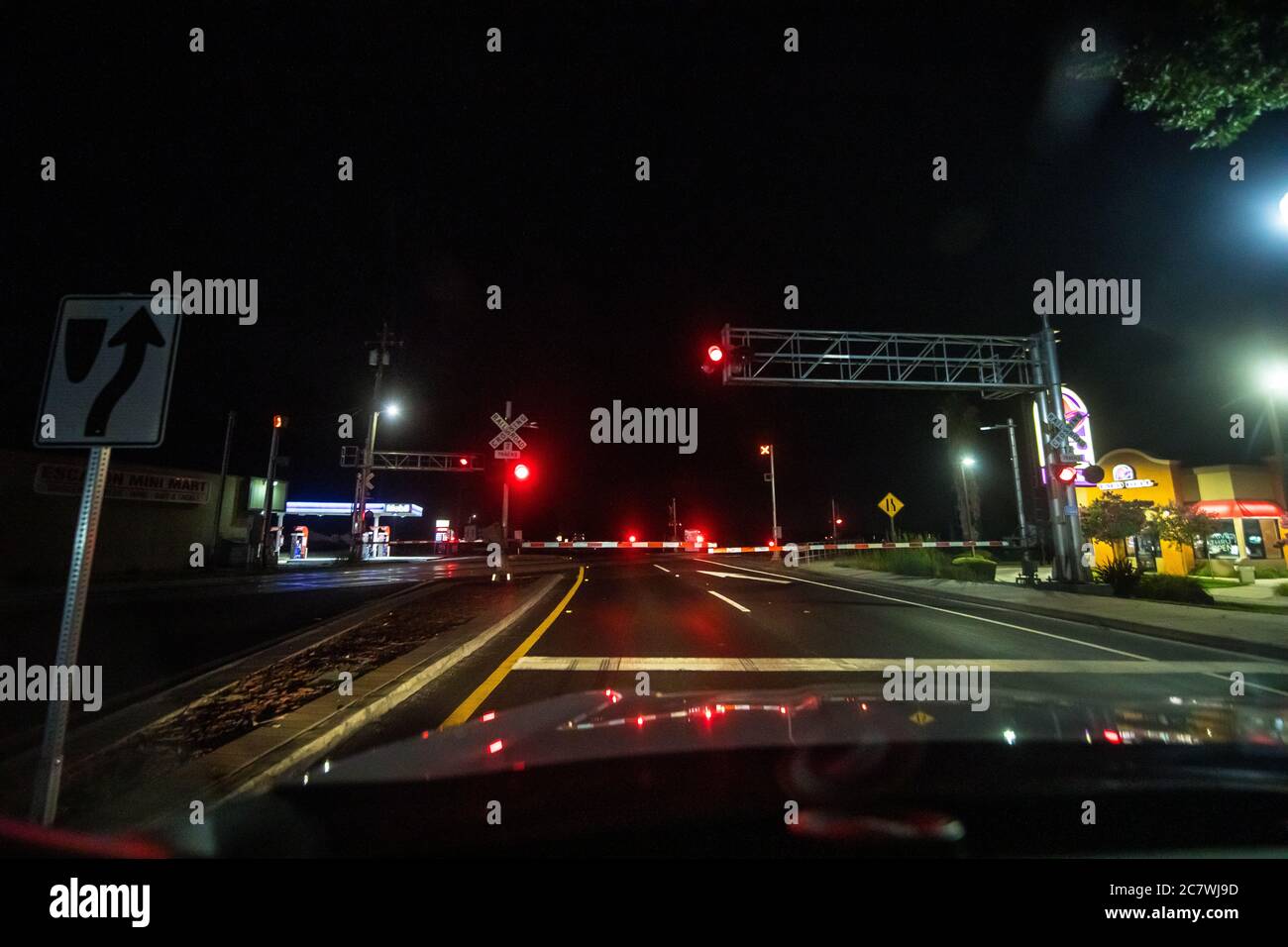 A railroad crossing in small town of Escalon California USA at around