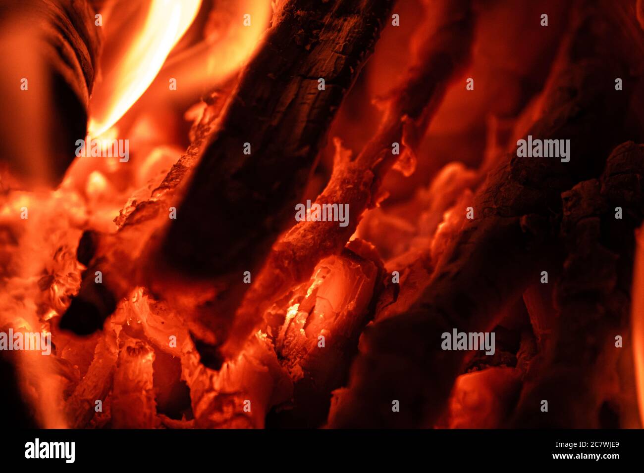 Dancing flame charcoal burning in the camp fire at night.e Stock Photo ...
