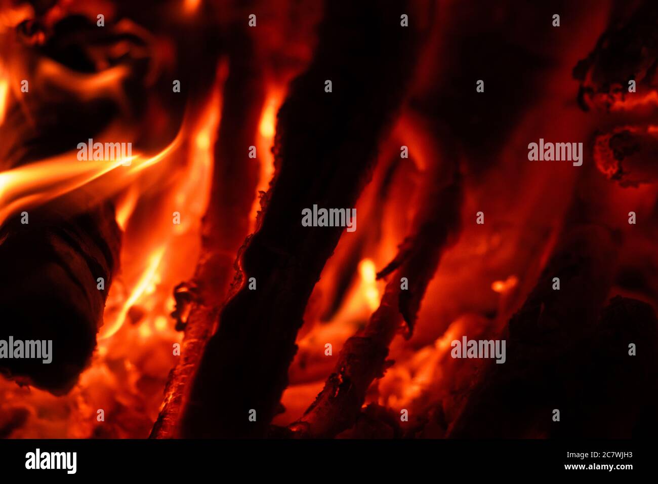 Dancing flame charcoal burning in the camp fire at night.e Stock Photo ...