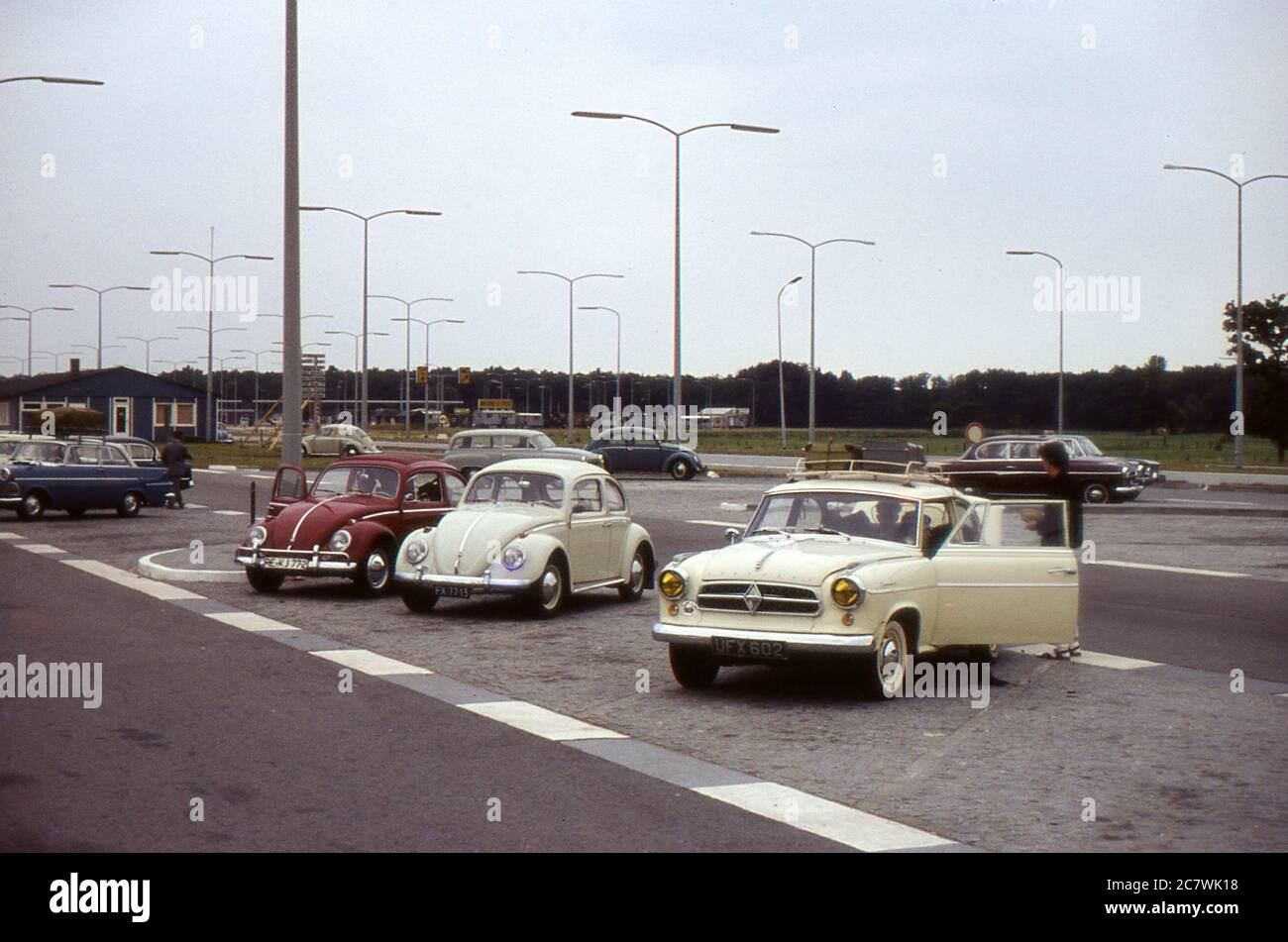 Cars parked at Emmerich, the border crossing between Germany and The Netherlands. 1963. Stock Photo