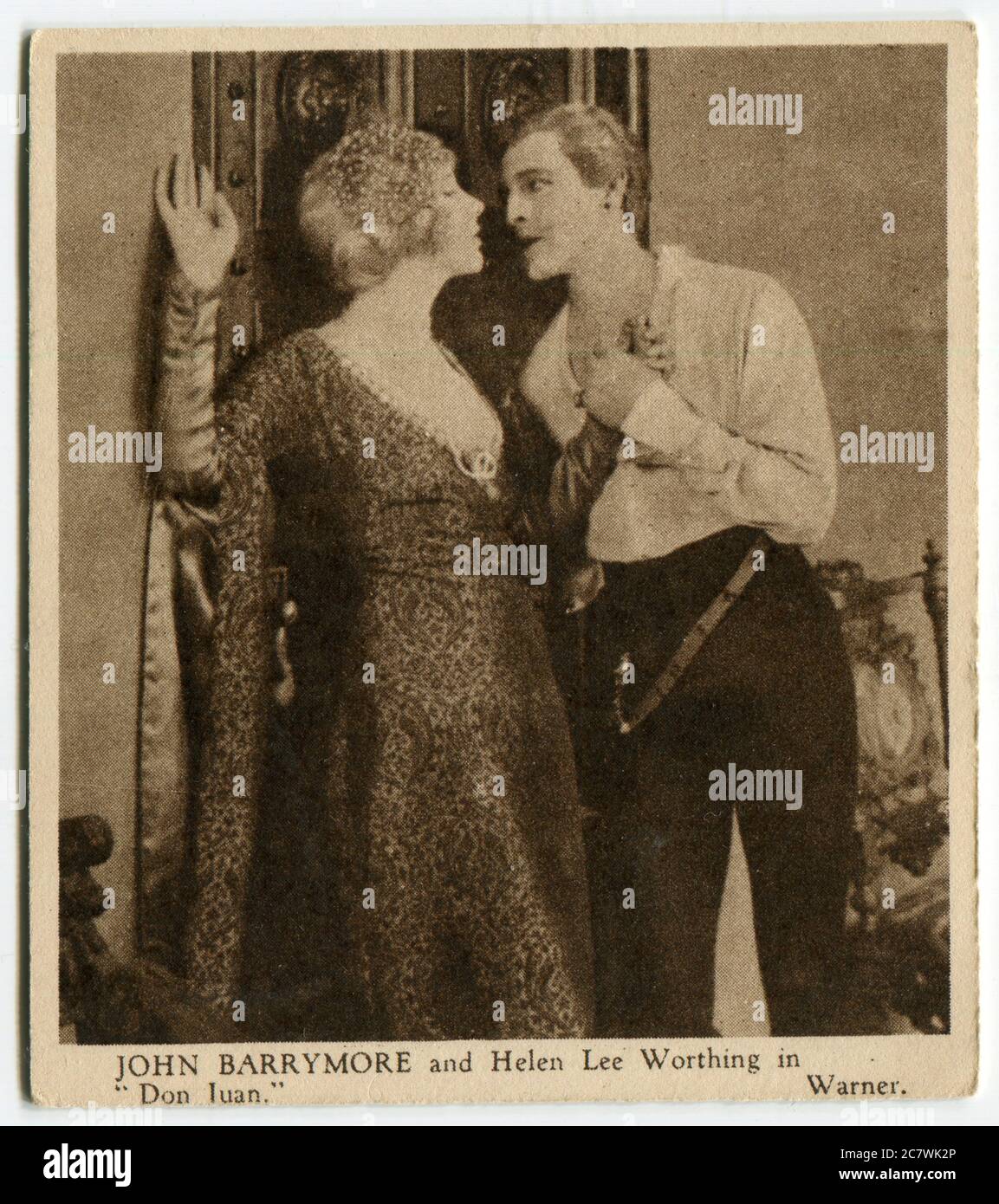 'Love Scenes from Famous Films' Kensitas cigarette card - John Barrymore and Helen Lee Worthing in 'Don Juan'. Second series published in 1932 by J. Wix & Sons Ltd. Stock Photo