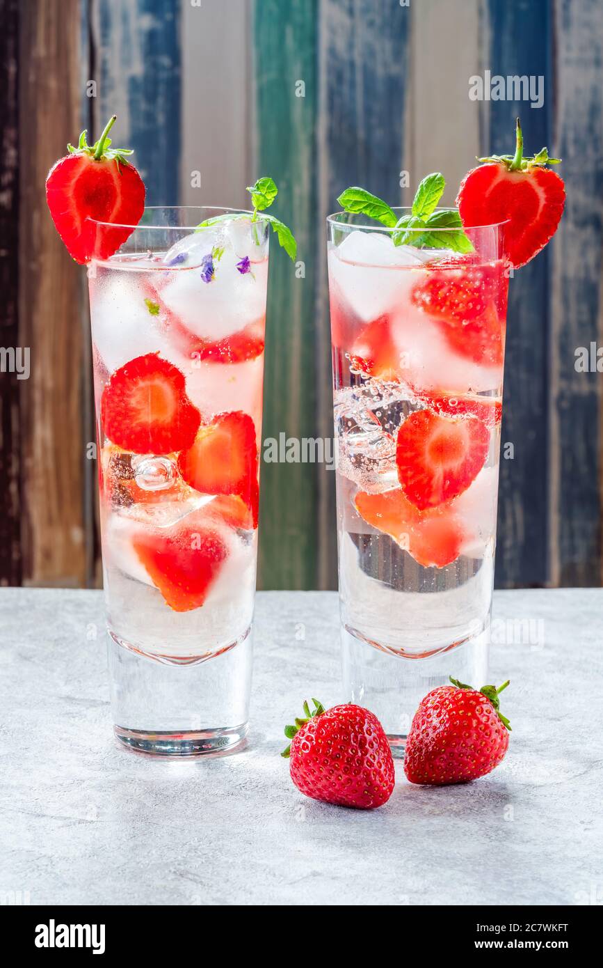 Elderflower And Vodka Cocktail With Strawberries Tonic Water And Ice Cubes Refreshing Summer Alcoholic Drink Stock Photo Alamy