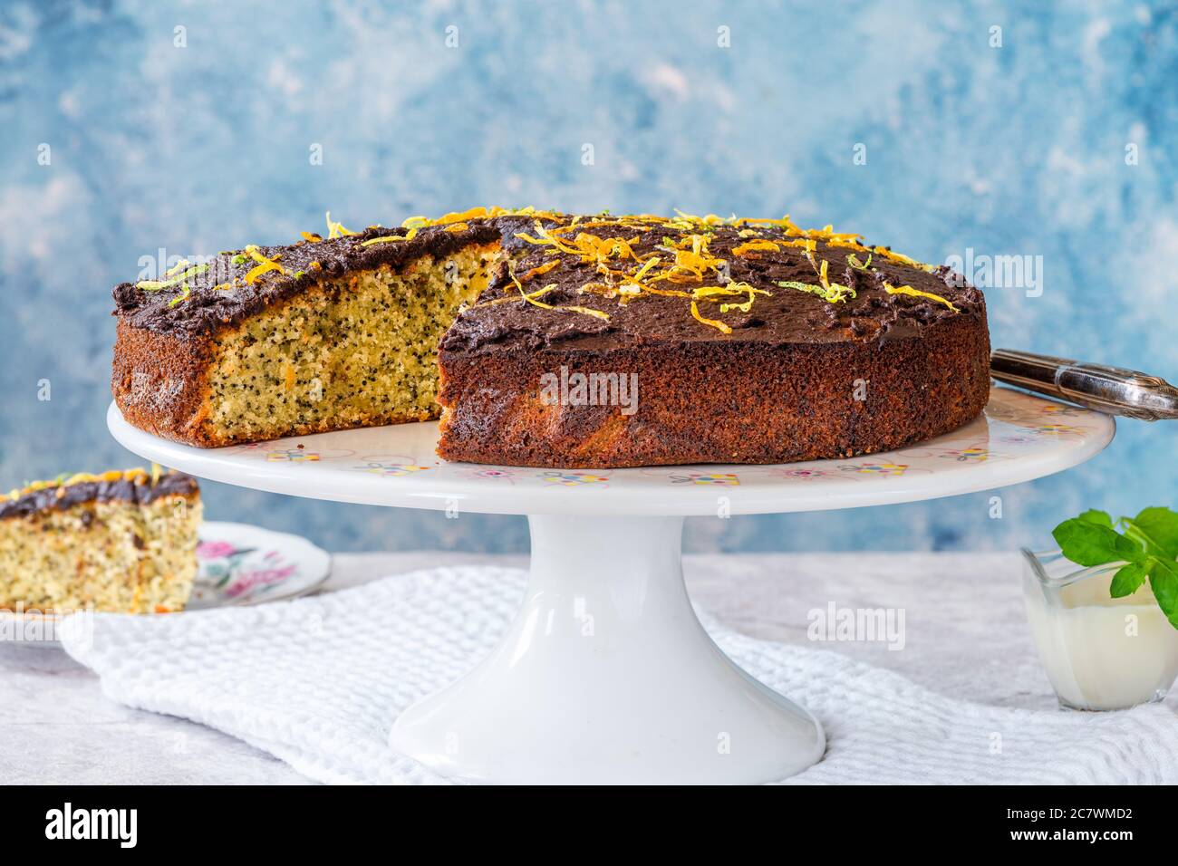 Orange and poppy seed cake with chocolate ganache Stock Photo Alamy
