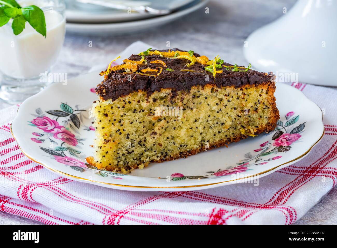 Orange and poppy seed cake with chocolate ganache Stock Photo Alamy