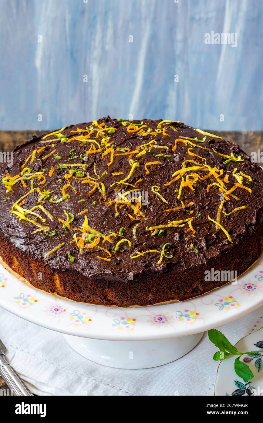 Orange and poppy seed cake with chocolate ganache Stock Photo Alamy