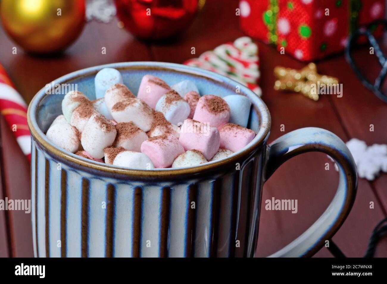 Hot chocolate in a mug on a wood table close-up Stock Photo
